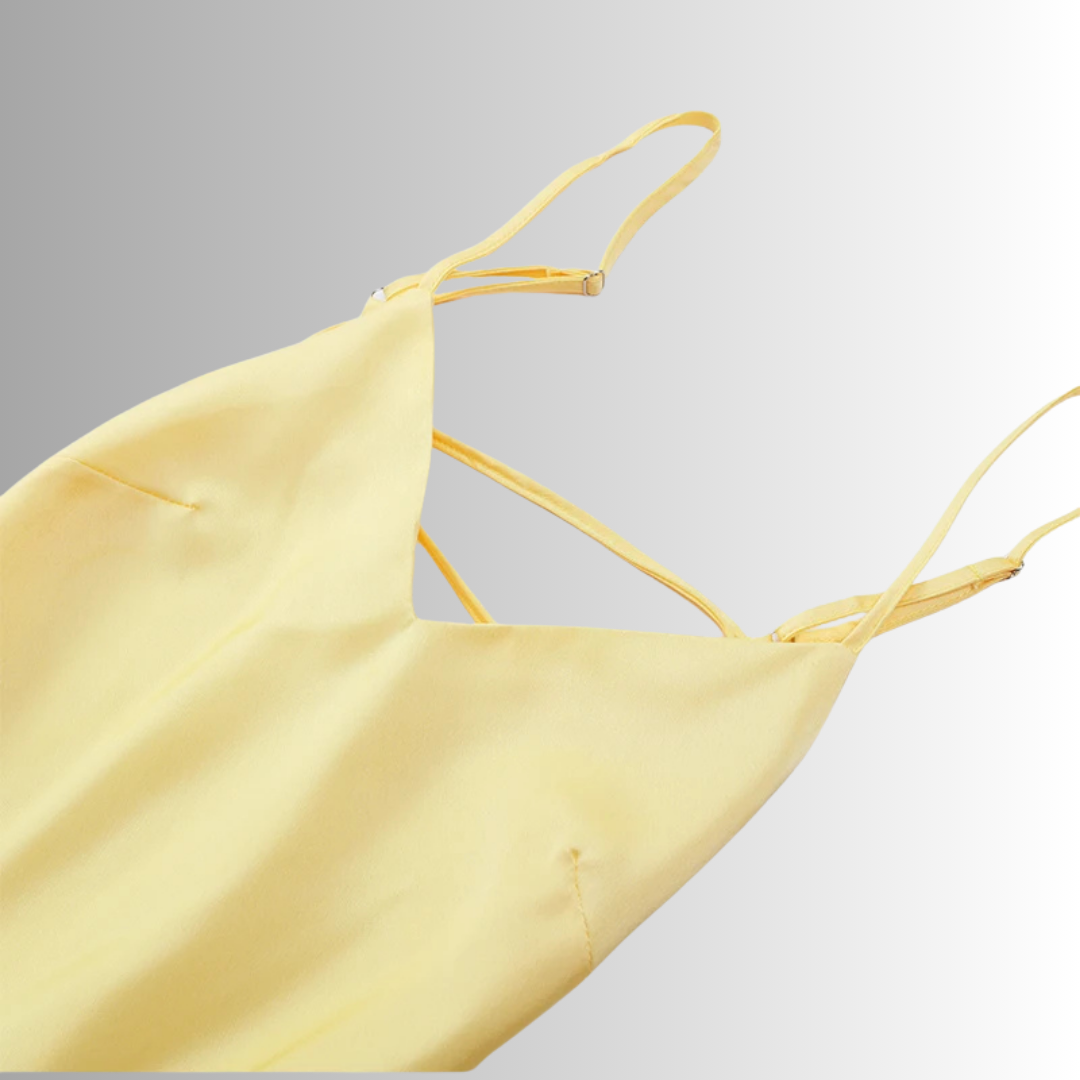 Draped neckline and silky fabric detail of satin mini dress