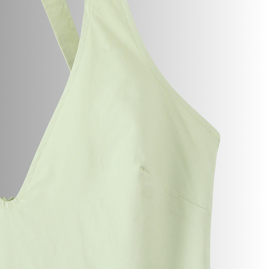 zoom view of green midi dress with tie-back halter_top