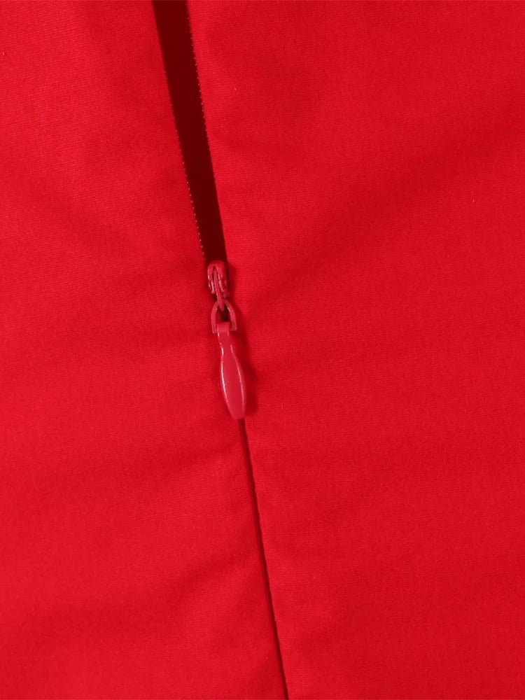 zoom view of red halter neck dress with tie-back design