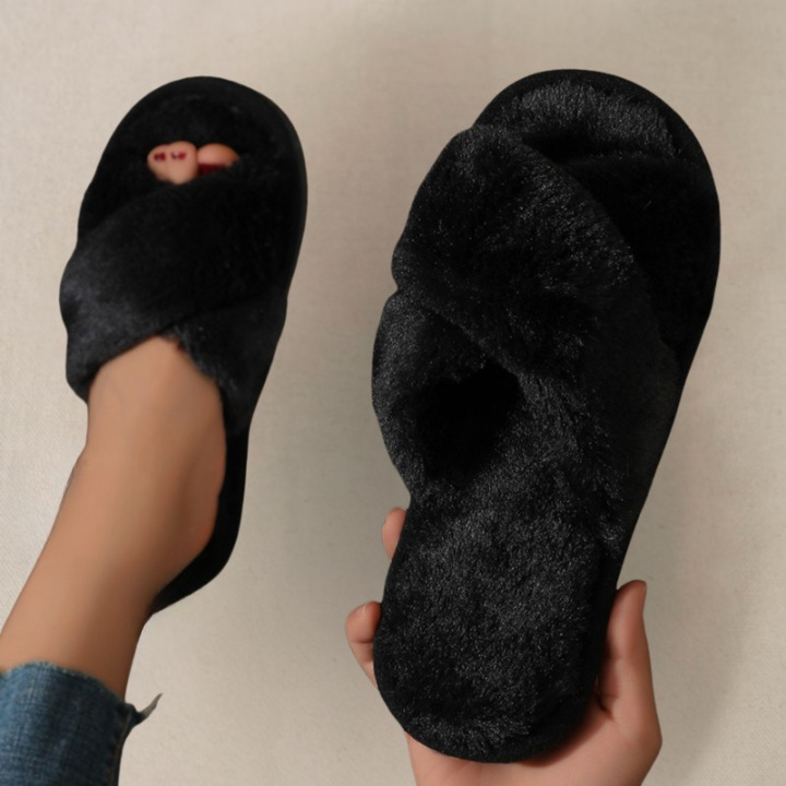 Close-up of black fluffy slippers texture