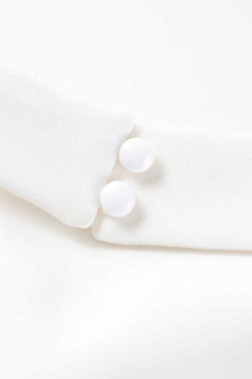 Elegant white maxi dress for women featuring a halter neckline and black lace details, ideal for evening and cocktail events