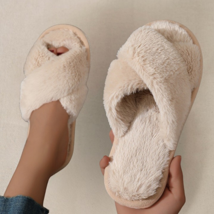 Close-up of beige fluffy slippers texture