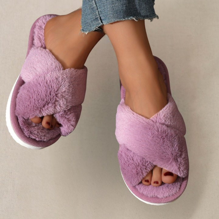 Close-up of purple fluffy slippers texture