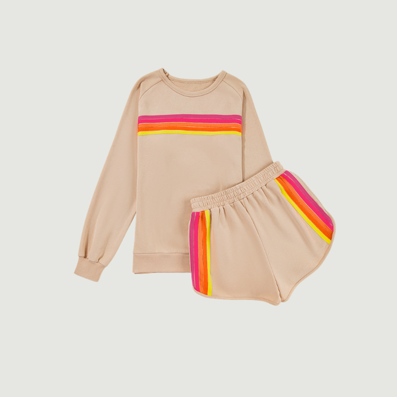 Close-up detail of colorful contrast stripes on beige oversized women’s sweatshirt