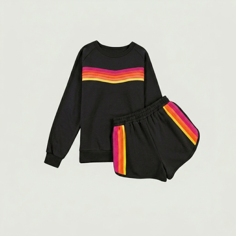 Close-up detail of colorful contrast stripes on black oversized women’s sweatshirt
