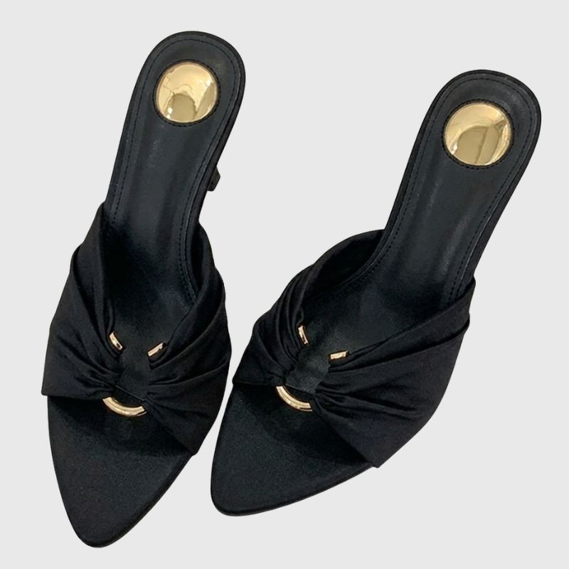 Close-up draped detail women’s black heeled mules