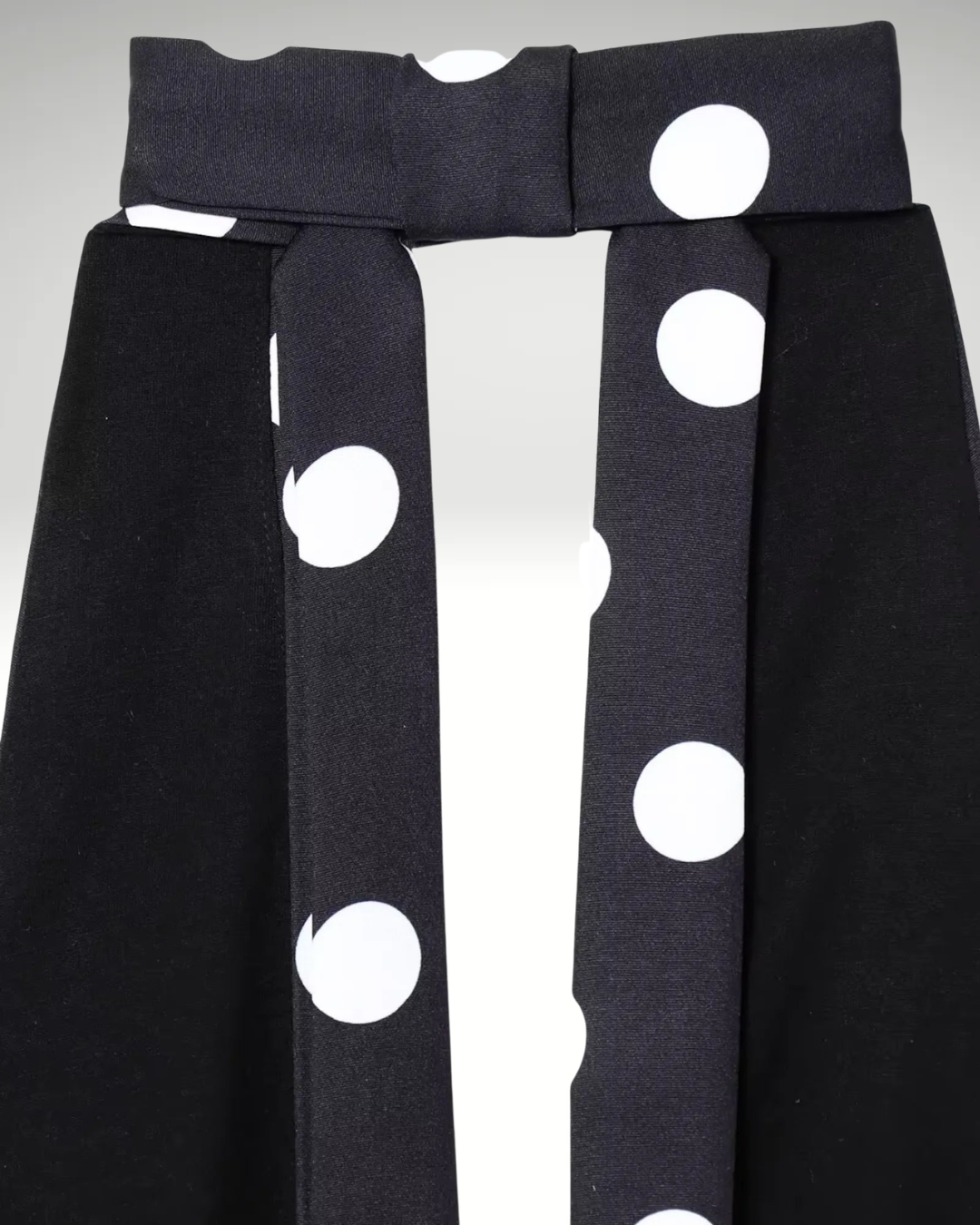 Halter neckline detail black polka dot top