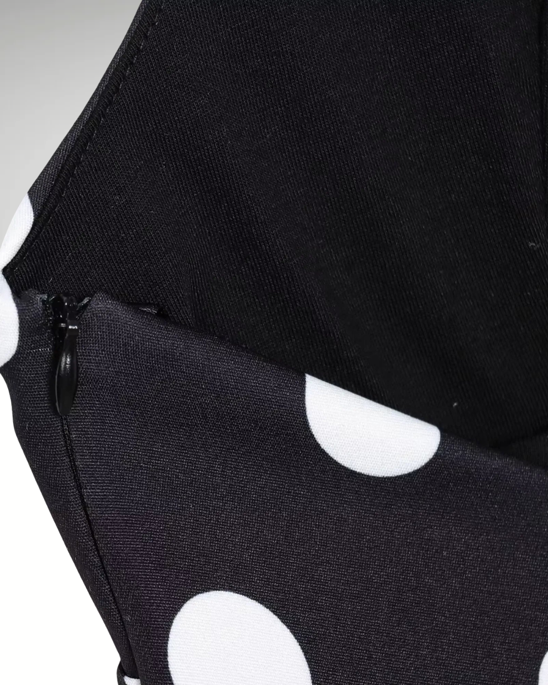 Halter neckline detail black polka dot top