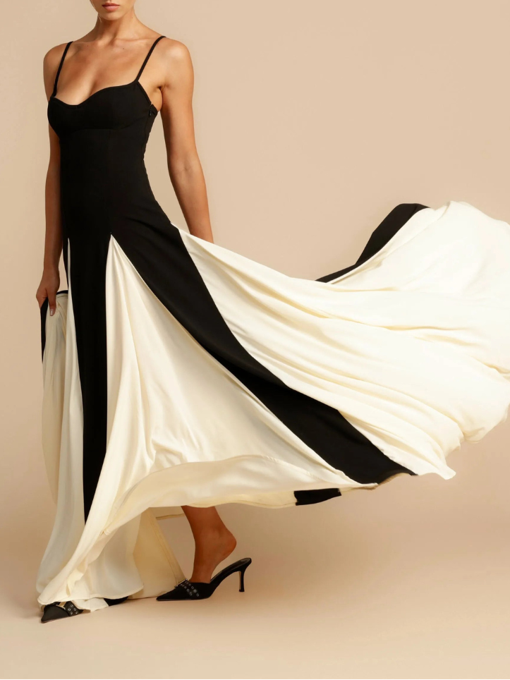 Black and white maxi dress – side view showing flattering fit and graceful flow
