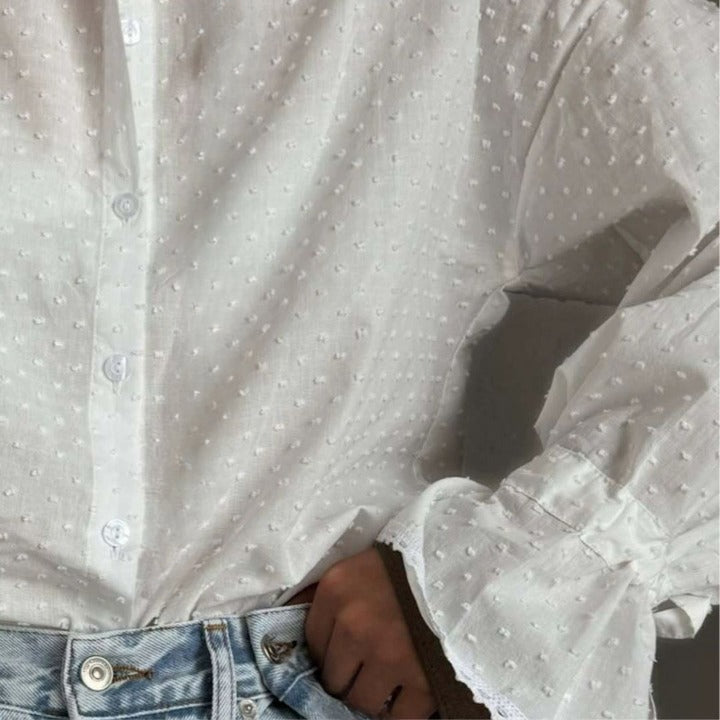 Woman wearing stylish white cotton shirt with jeans