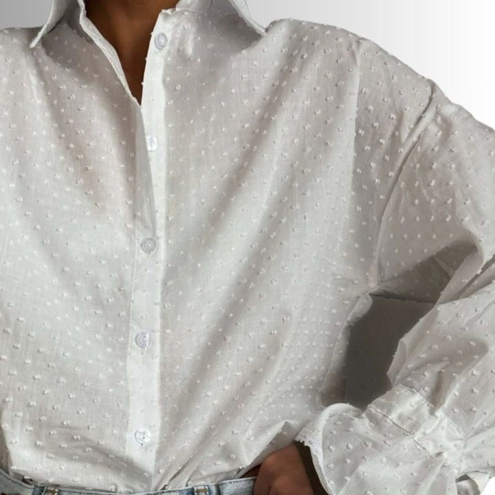 Close-up of sleeve detail on lightweight cotton shirt