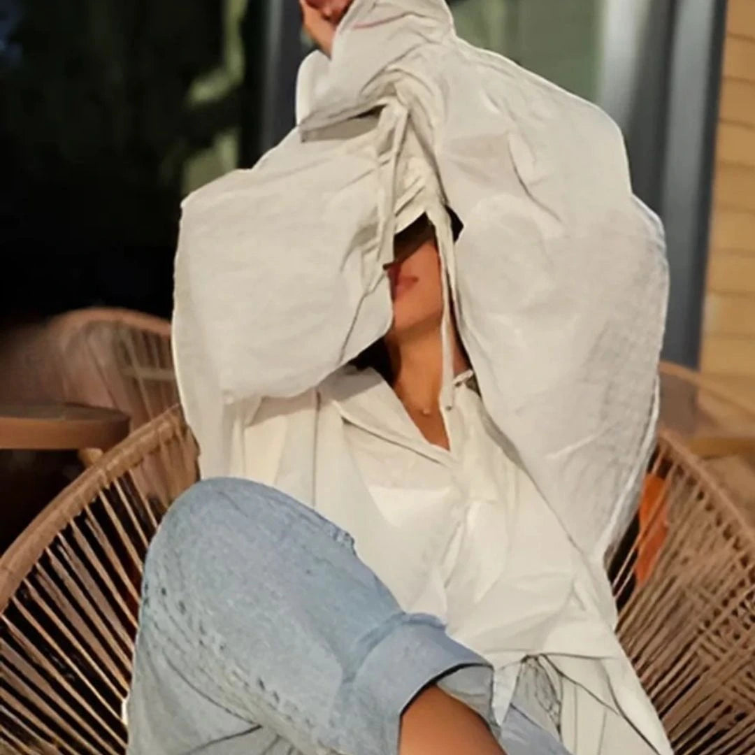 Woman wearing stylish white cotton shirt with jeans