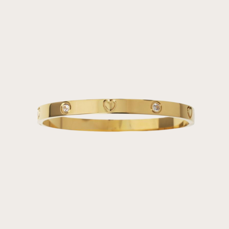 Ella Gold Bangle Bracelet worn alone for a chic minimalist look