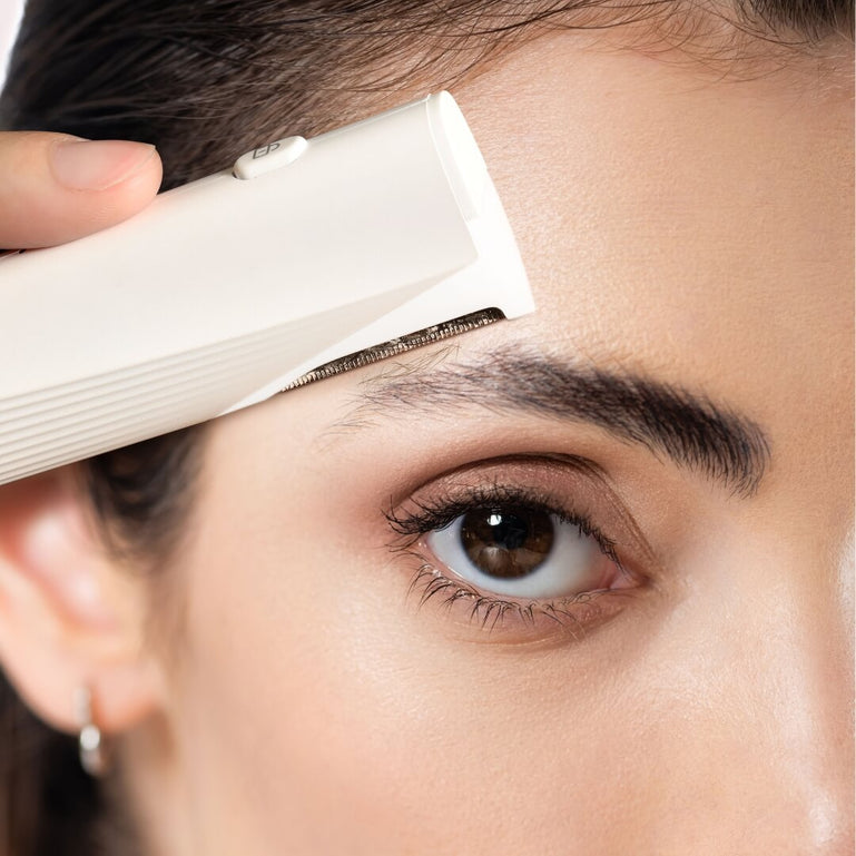 Close-up of GlissSkin+ Dermaplaning Tool blade for gentle exfoliation