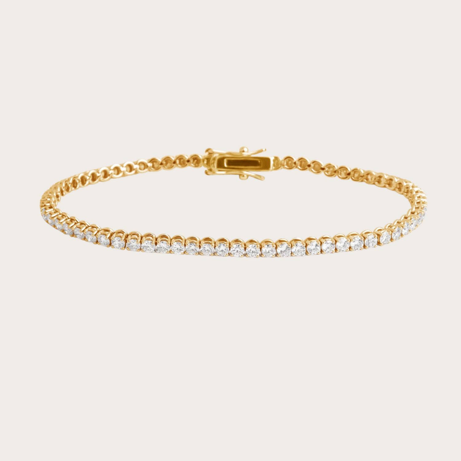 Gold tennis bracelet for women featuring radiant cubic zirconia, stylish and refined jewelry piece.