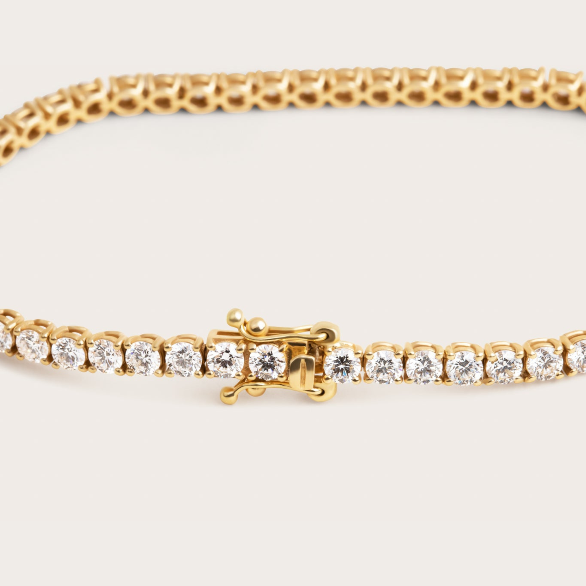 Gold tennis bracelet for women
