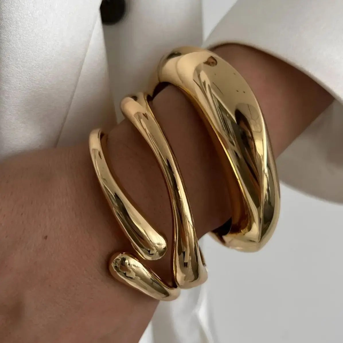 Front view of Ilona Golden Cuff Bracelet, bold sculptural design