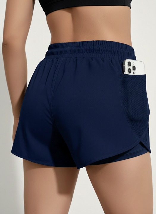 Navy blue women’s sports shorts with pockets  back view