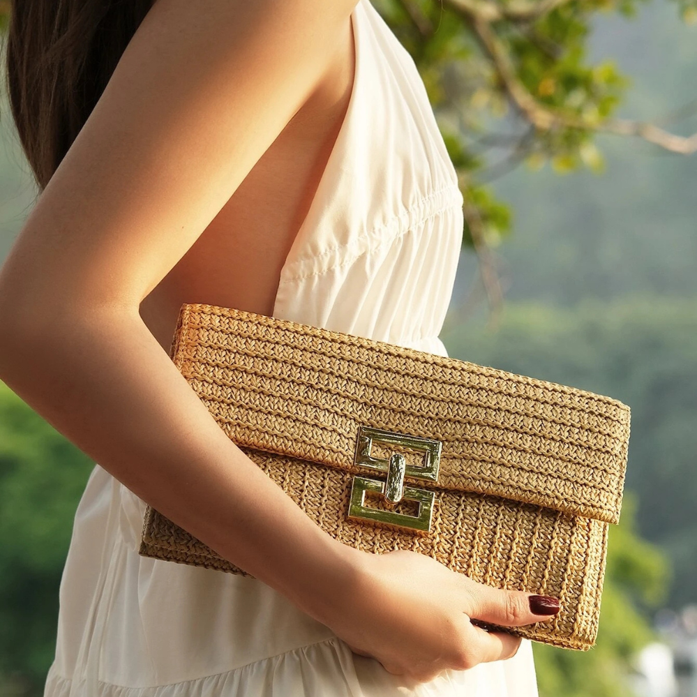 Side view of the Raya boho chic woven summer clutch in natural beige