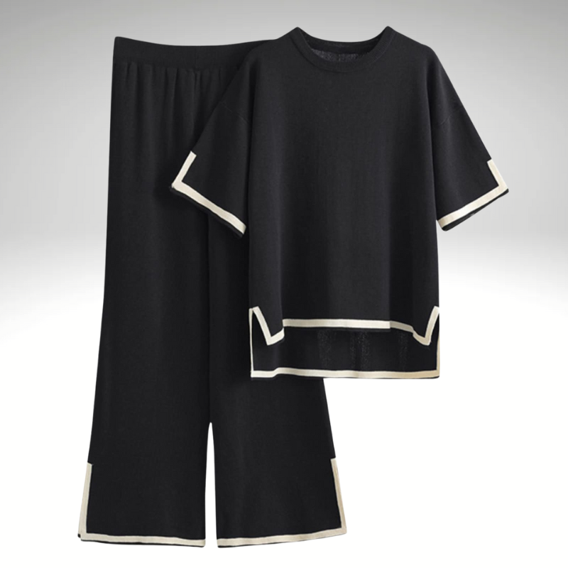 Close-up of soft knitted fabric – V-neck sweater and pants set -black