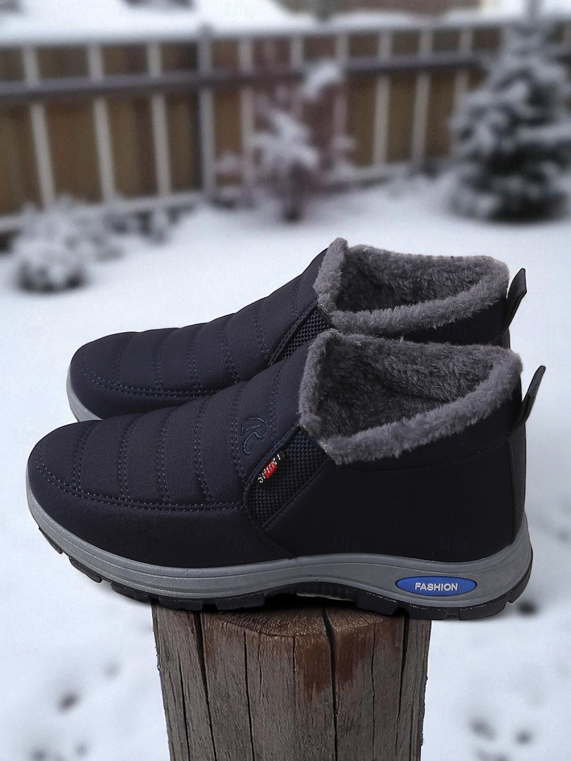 Black waterproof unisex snow boots – warm plush lining & anti-slip sole