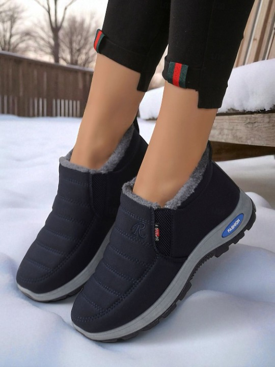 Black waterproof unisex snow boots – warm plush lining & anti-slip sole