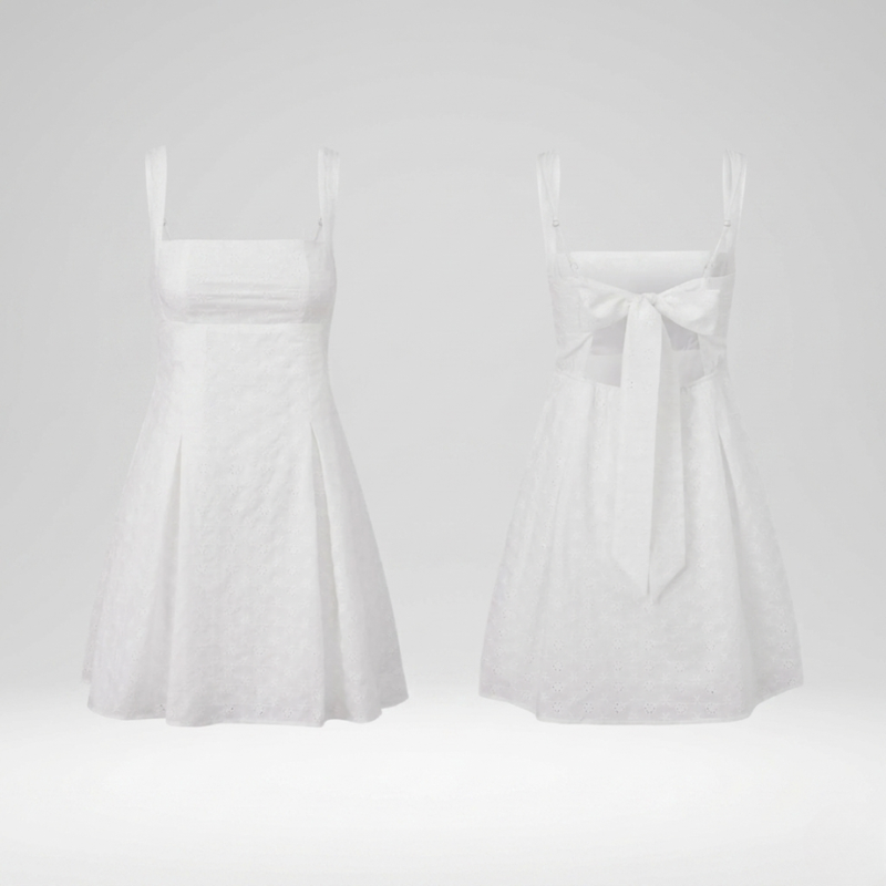 Side view of women’s white summer dress with lightweight retro-inspired A-line fit