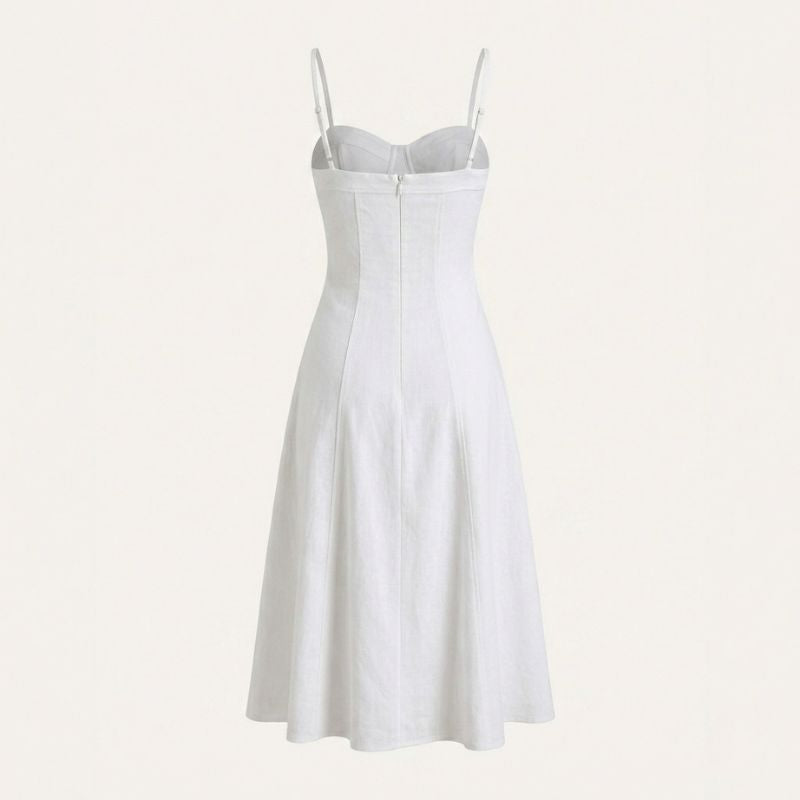 Close-up back view of elegant white midi dress for women with delicate straps and backless design
