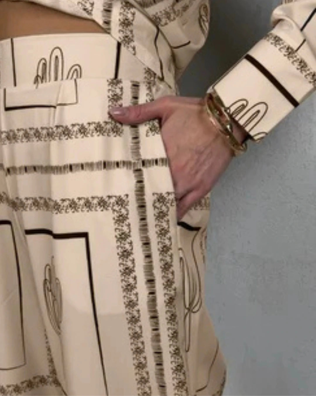 Women's set with beige  pants featuring cactus patterns