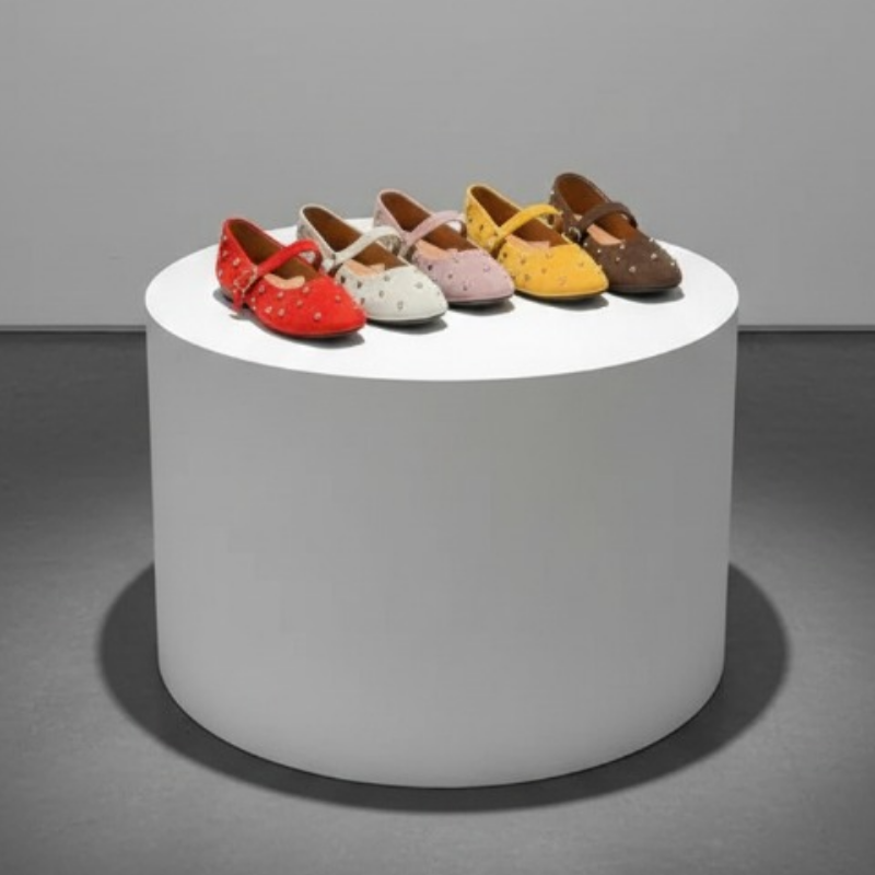 Women’s ballerina flats available in brown, red, gray, pink, and yellow