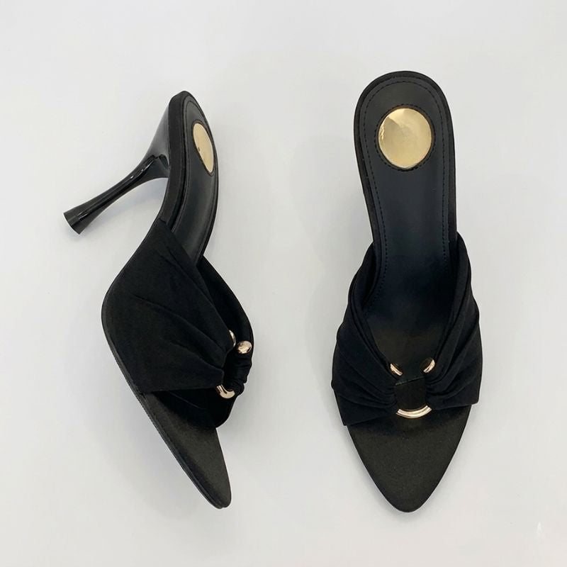 Women’s black slim heel mules side profile