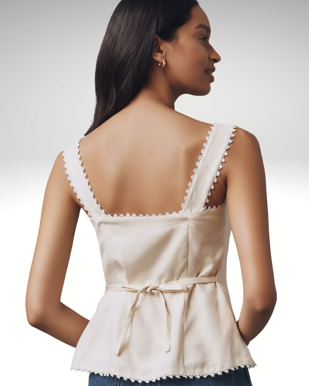 beige sleeveless women’s top elegant back view