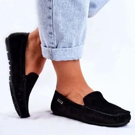 side view of black casual flats women