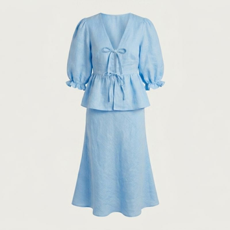 blue  two piece outfit close up showing lace up v neck and garment details