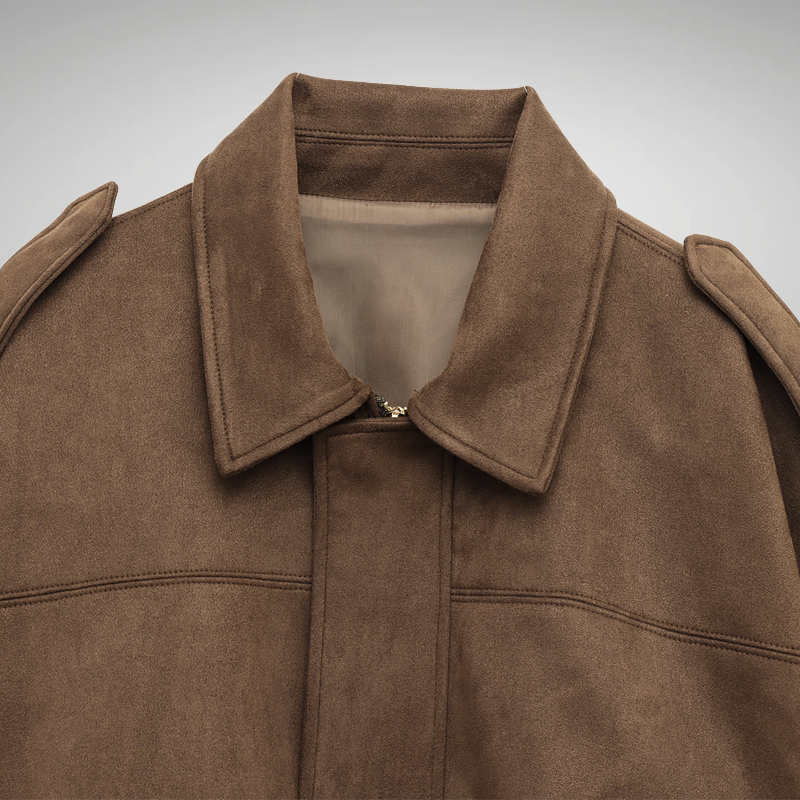 Women’s brown bomber jacket styled with jeans streetwear