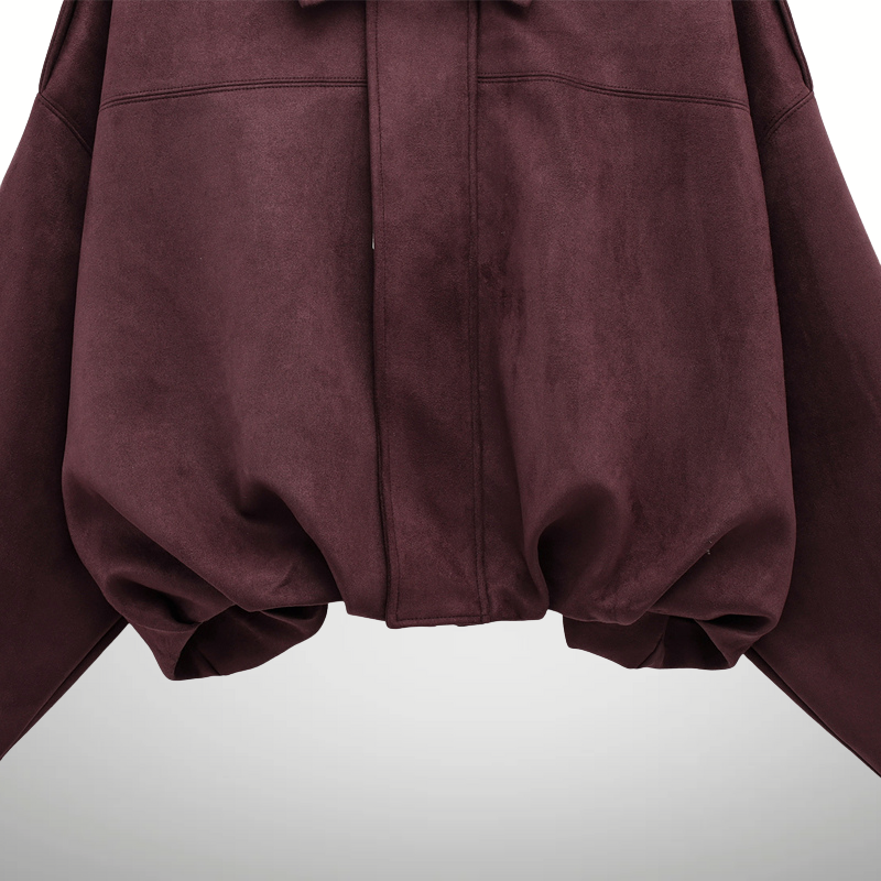 Lifestyle photo of women’s burgundy suede bomber jacket