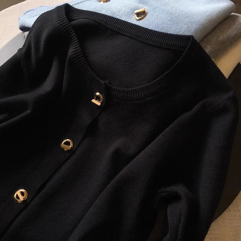 Women’s black knitted cardigan with gold buttons – round neck and long sleeves