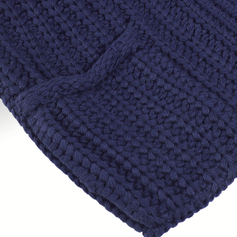 Detail of V-neck and buttons blue vest