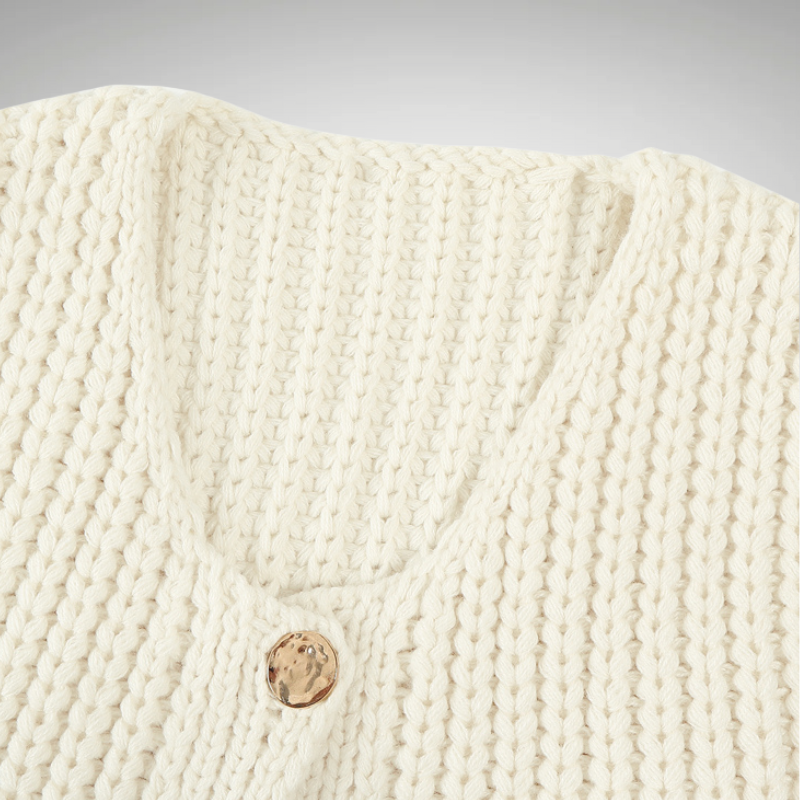 Detail of V-neck and buttons white vest