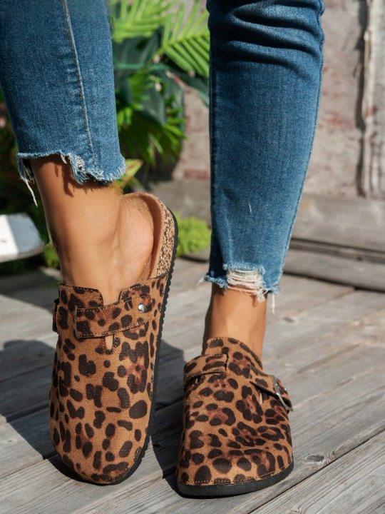 Women’s leopard print mules with cork sole and metal buckle