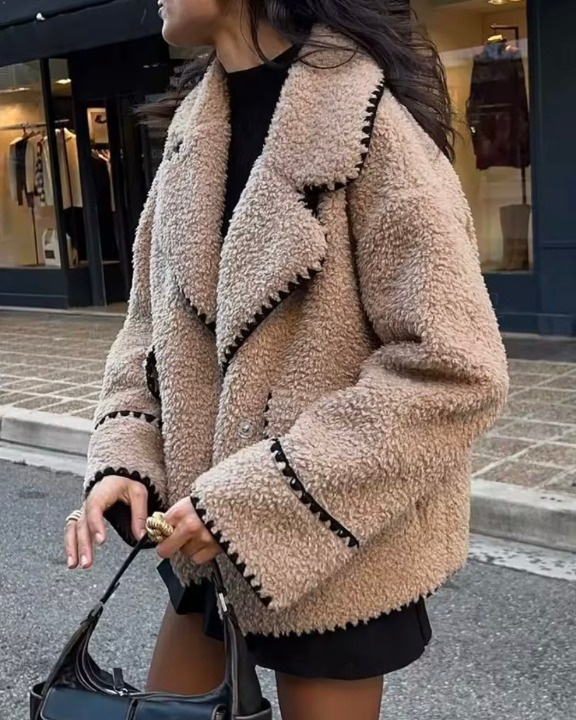 Women’s oversized faux fur winter coat with button closure