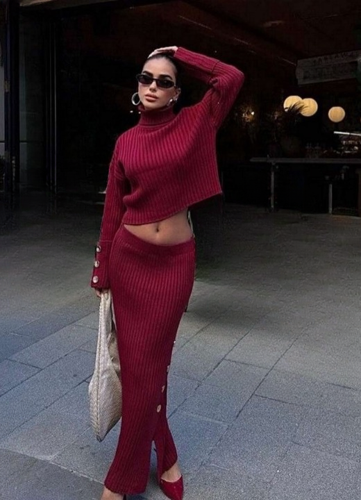 Women’s red knitted set with turtleneck sweater and long slit skirt – chic winter fashion.
