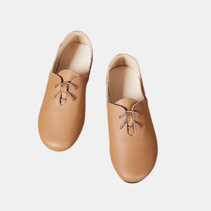 finish and lace-up detail on women’s shoes in brown 
