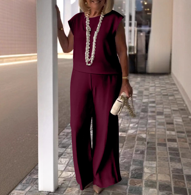 Burgundy women’s two-piece set – chic and flowy pants outfit for office or evening.
