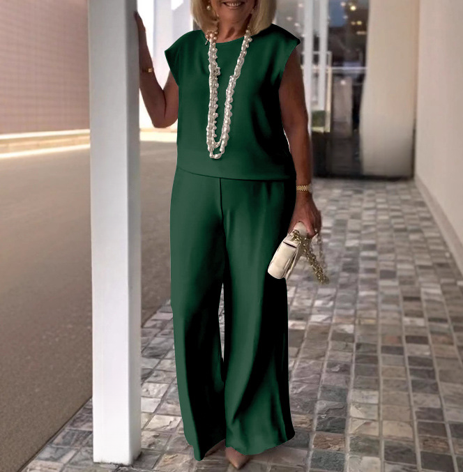 Casual chic green two-piece set for women – sleeveless round-neck top and flowy pants.