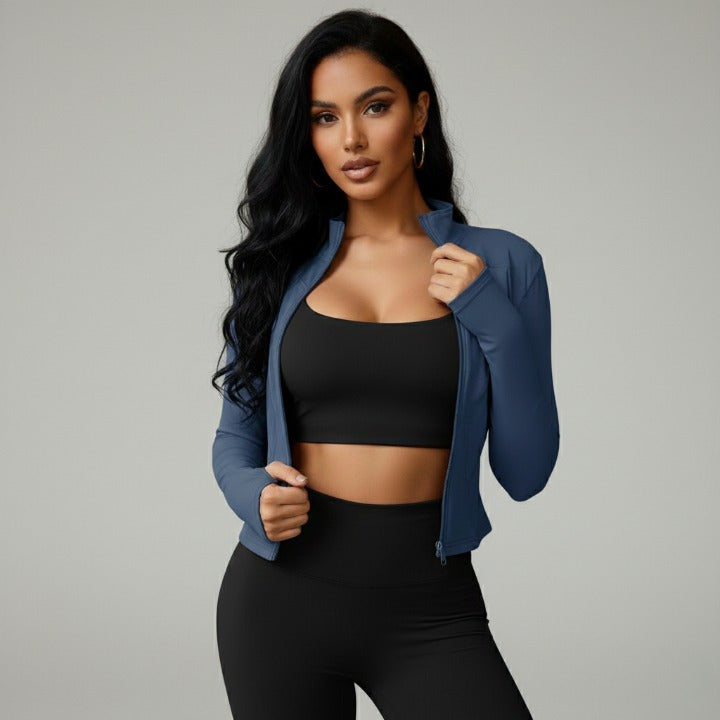 Blue women’s zip-up sports jacket with turtleneck – side view