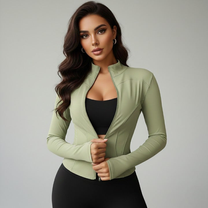 Green women’s zip-up sports jacket with turtleneck – closeup 