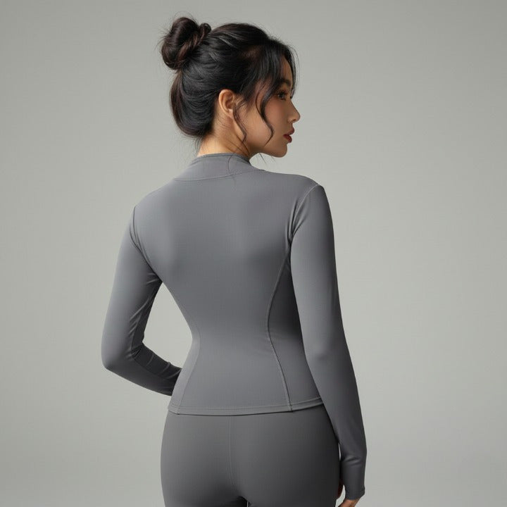 Grey  fitted women’s sports jacket – back view