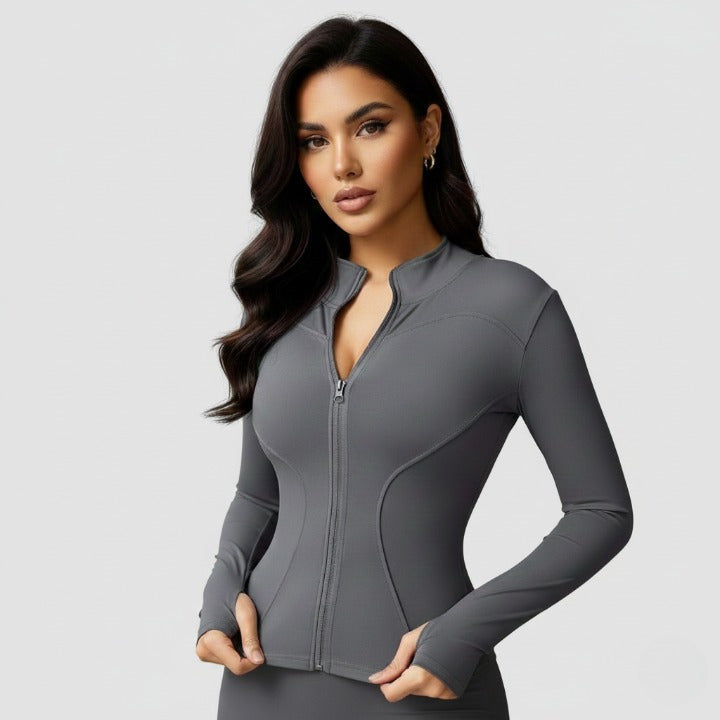 Grey women’s zip-up sports jacket with turtleneck – front view